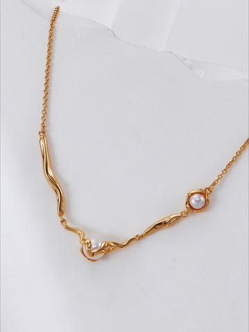 Streamlined Metal Pearl Necklace